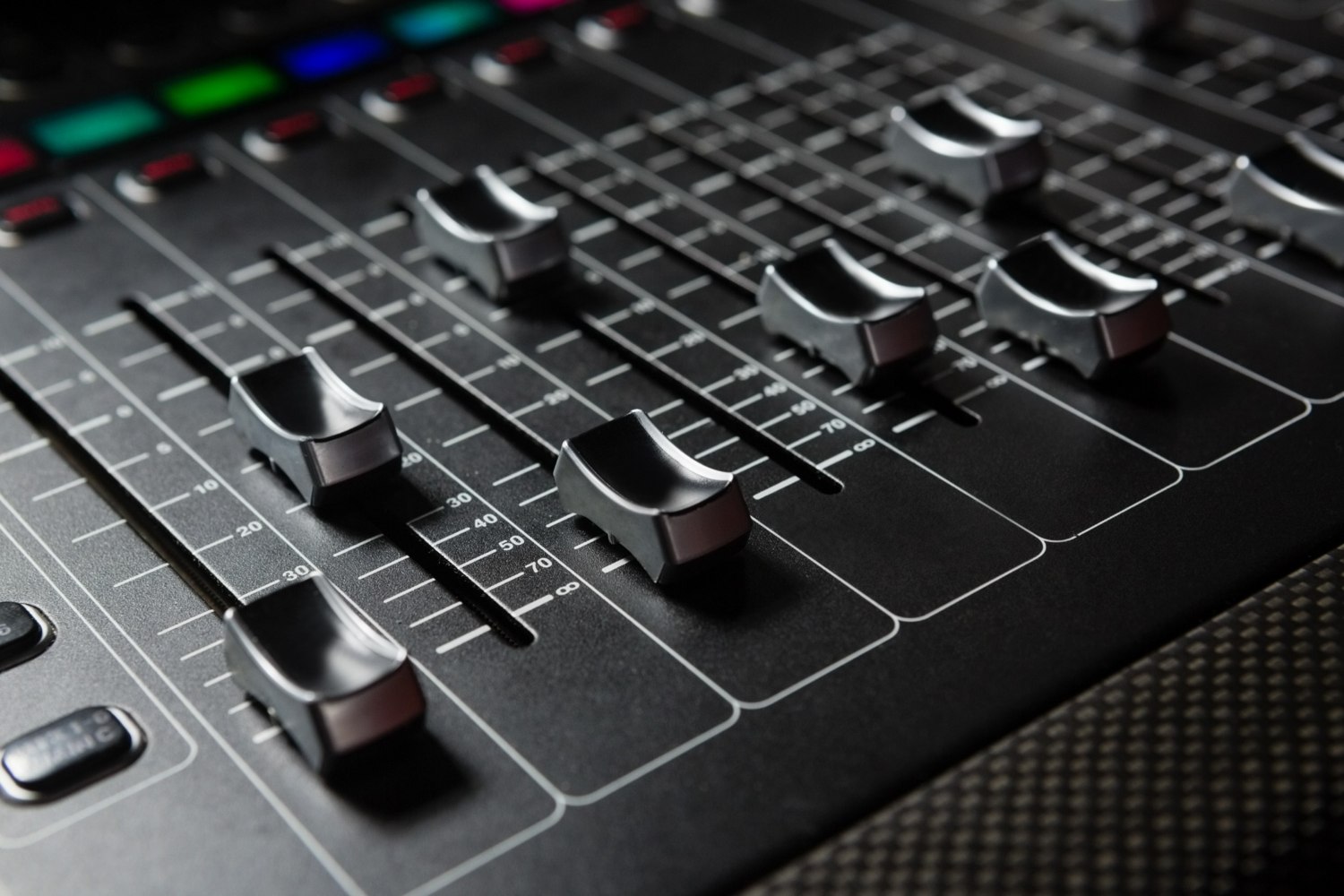 Audio mixing console with faders for studio recording